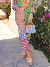 Pantalones bombachos holgados con bolsillos y cintura elástica con estampado único y colorido